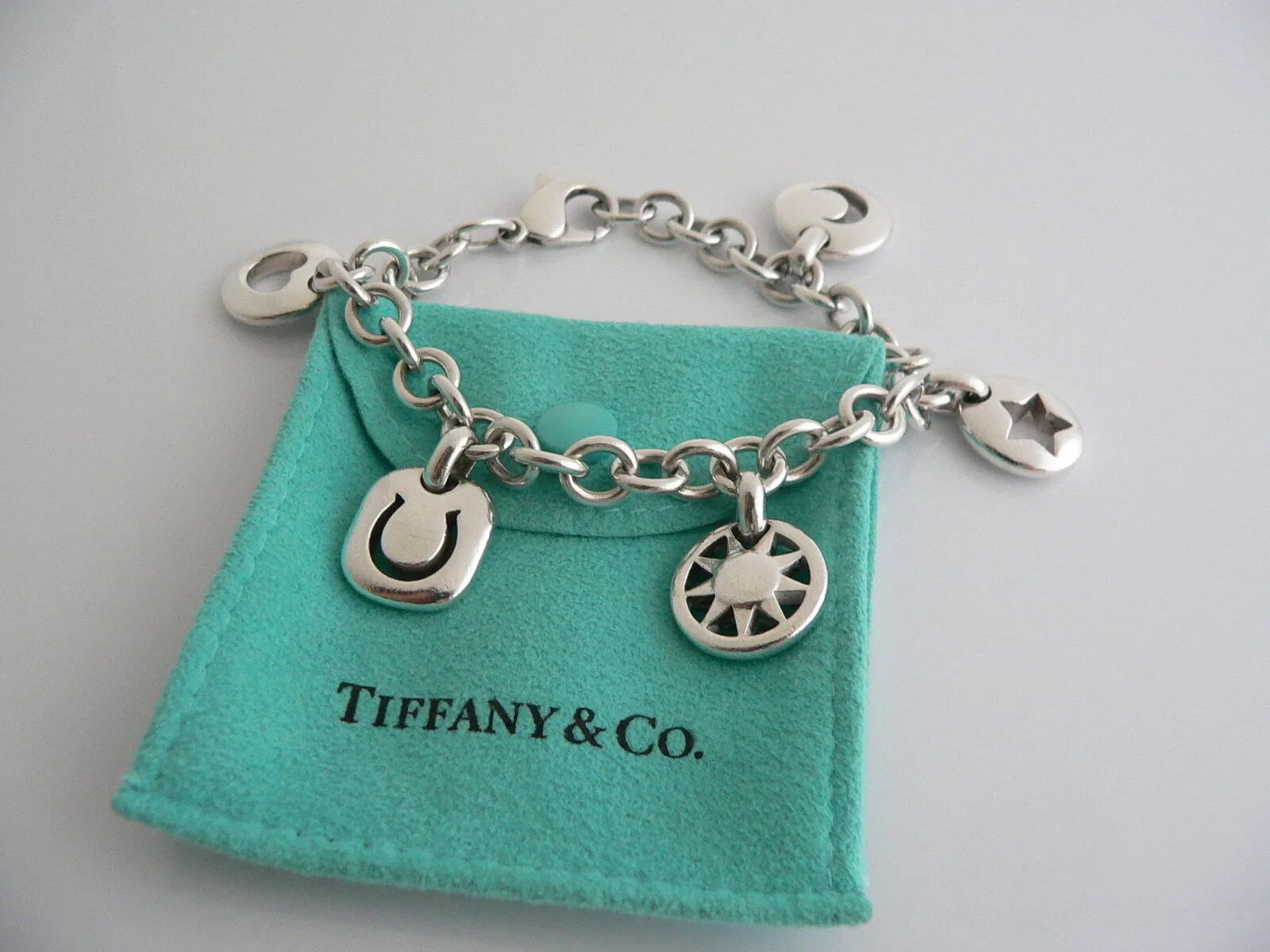 Tiffany & Co Silver Heart Sun Star Moon Horseshoe Bracelet Stencil Charm Bangle